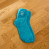 Turquoise fluffy socks with Point Your Toes embroidery