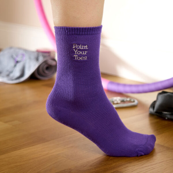 Purple socks with Point Your Toes embroidery